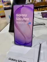 Samsung Galaxy S26 Ultra with its S Pen, front view on a display stand