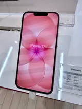 Apple iPhone 17e in soft pink, front view on a display stand
