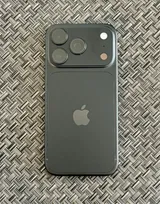 Rear of a black Apple iPhone 18 Pro on a textured mat